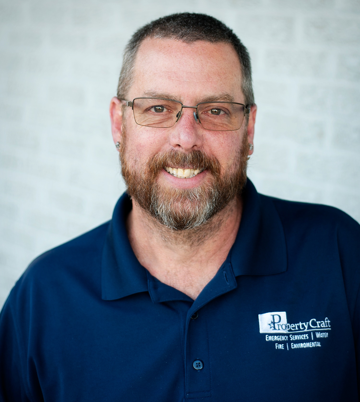 a man in a blue shirt