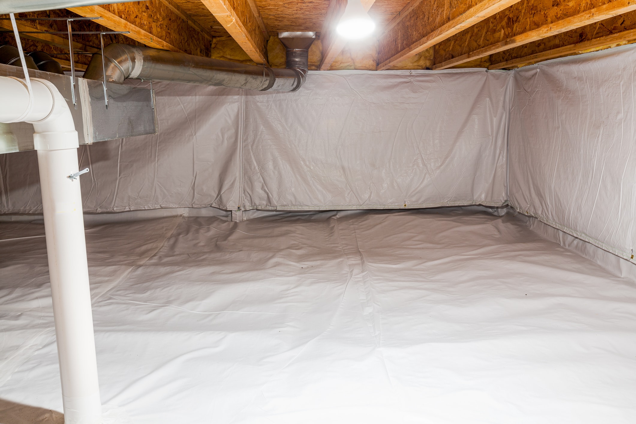 a basement with a vapor barrier installed