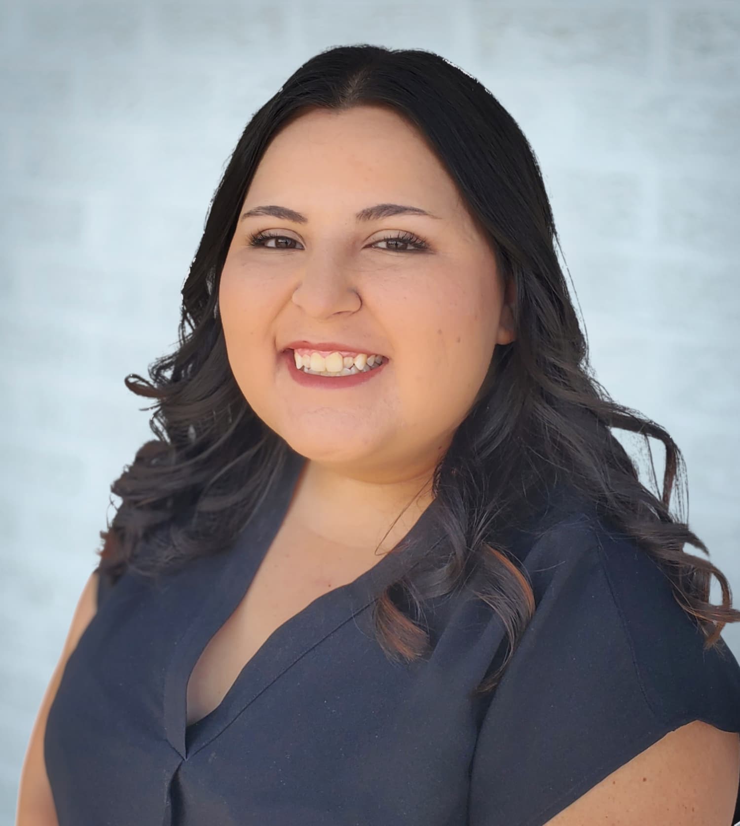 a woman smiling for the camera