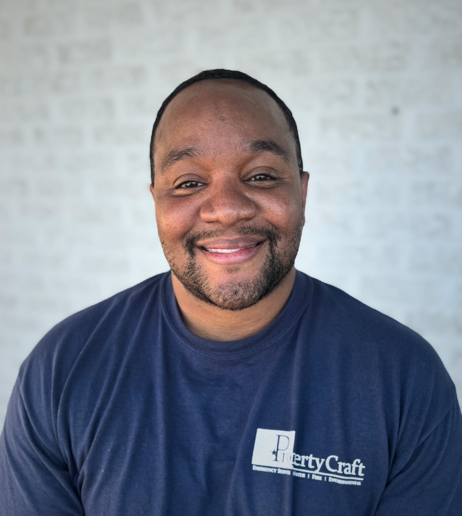 a man in a blue shirt